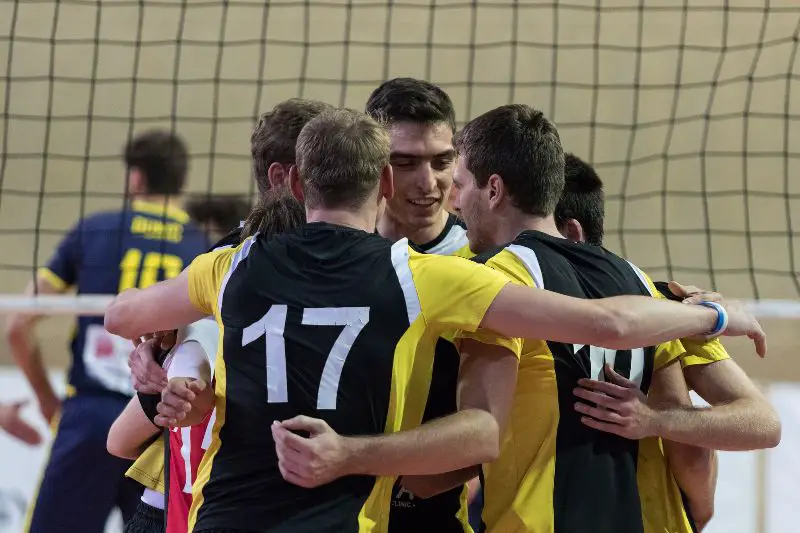 why do volleyball players hug so much